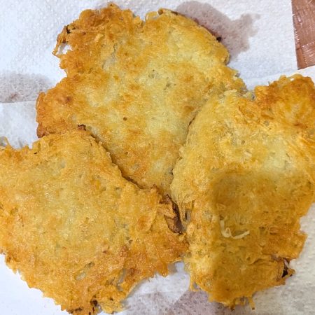 Golden Potato Fritters on Paper Towel