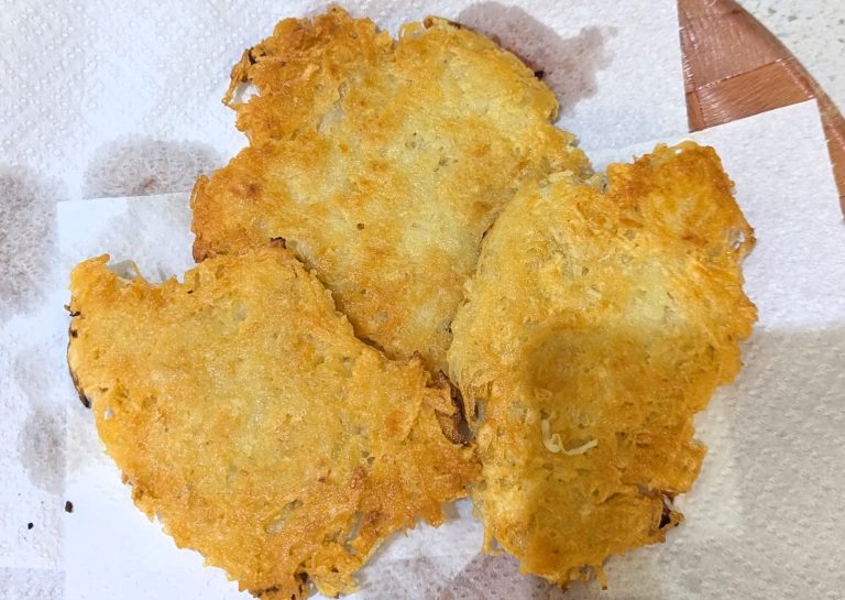 Golden Potato Fritters on Paper Towel