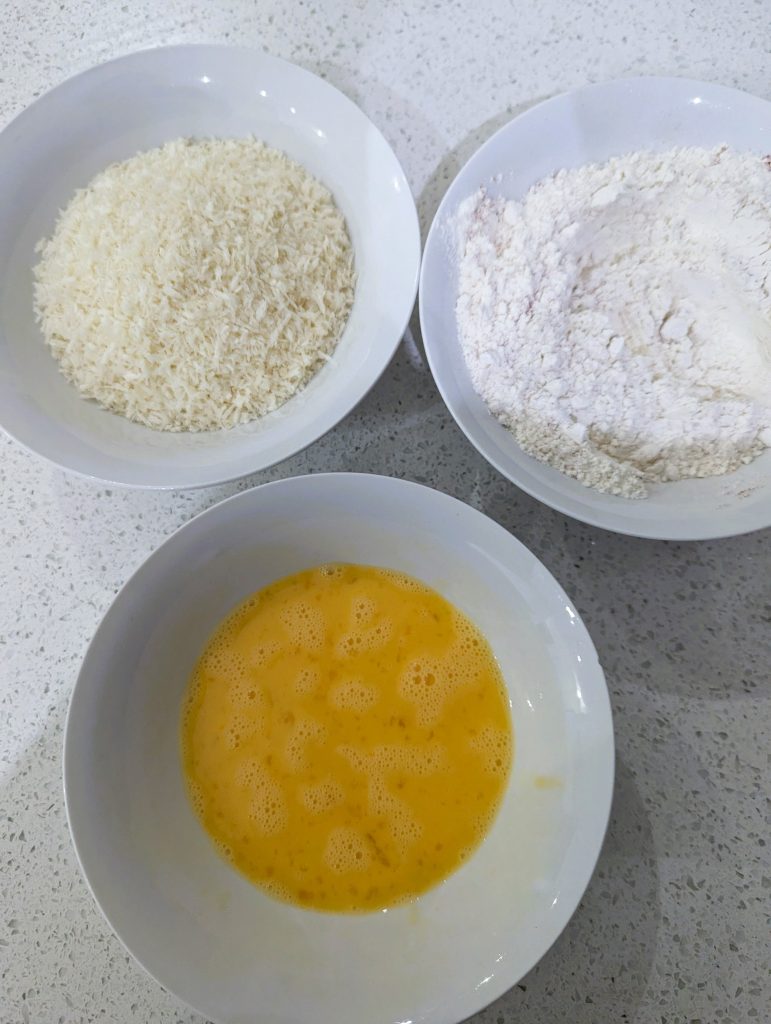 Panko Crumbs, Flour, Whisked Egg in Bowls